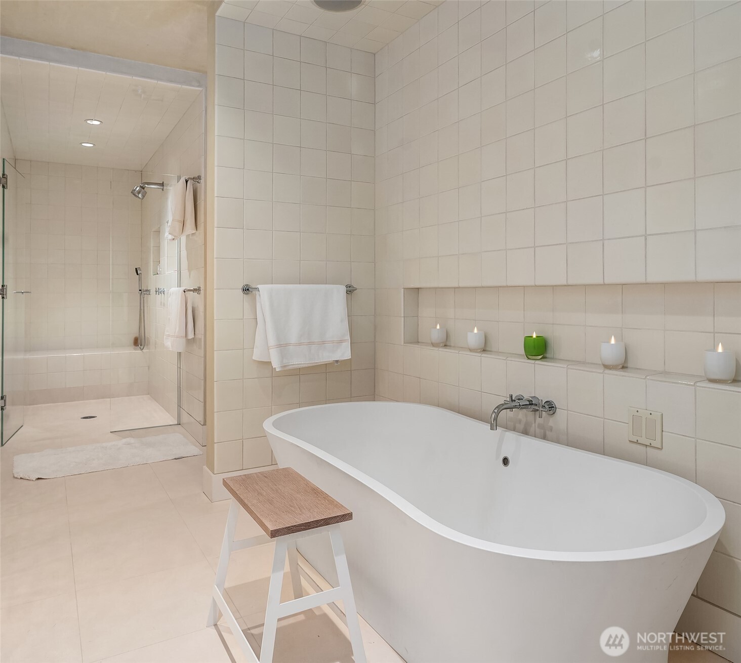 715 2nd Avenue, Unit 1501 Seattle, WA 98104 - Photo 29 of 40 a bathroom with a bathtub and shower
