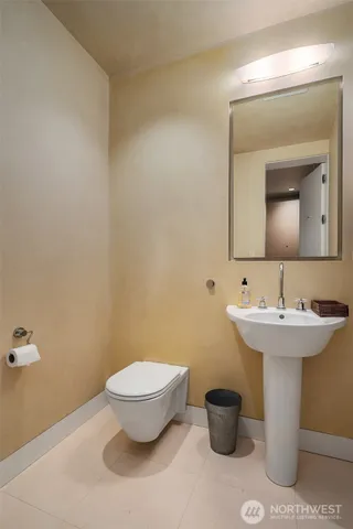 a utility room with sink dryer and washer