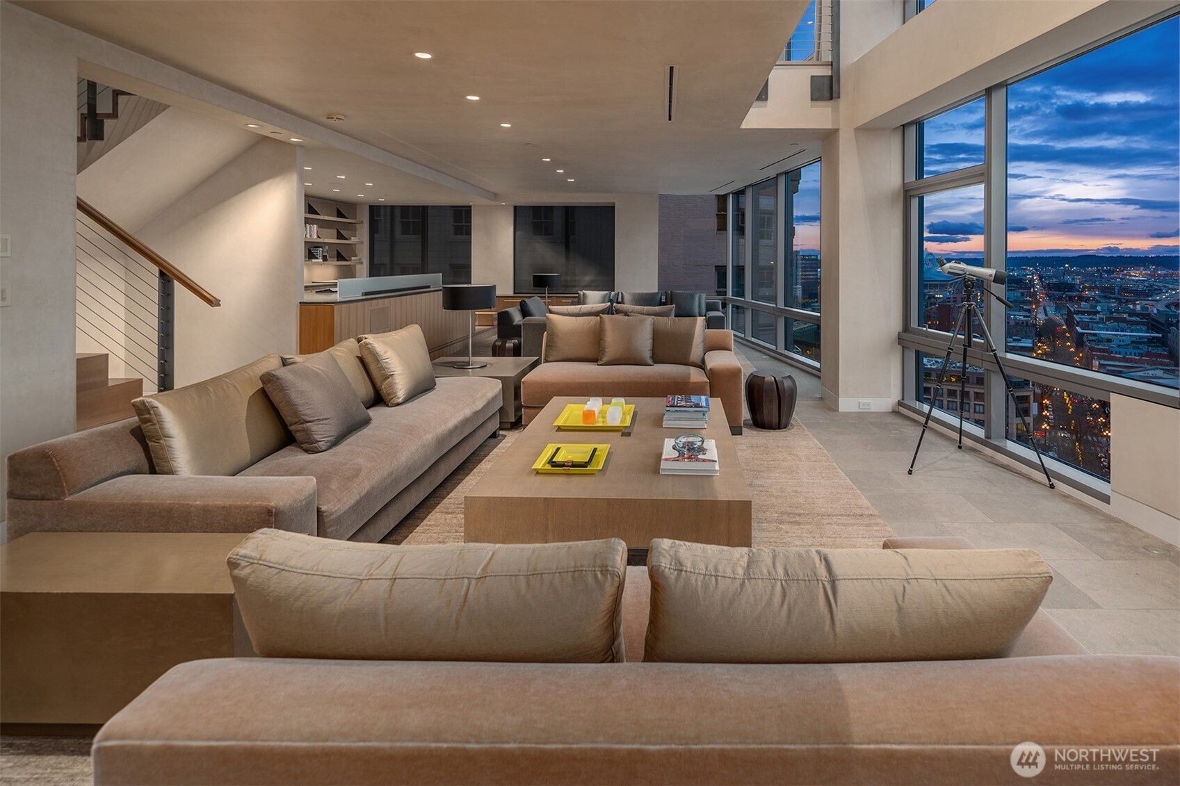 715 2nd Avenue, Unit 1501 Seattle, WA 98104 - Photo 5 of 40 a living room with furniture and a large window