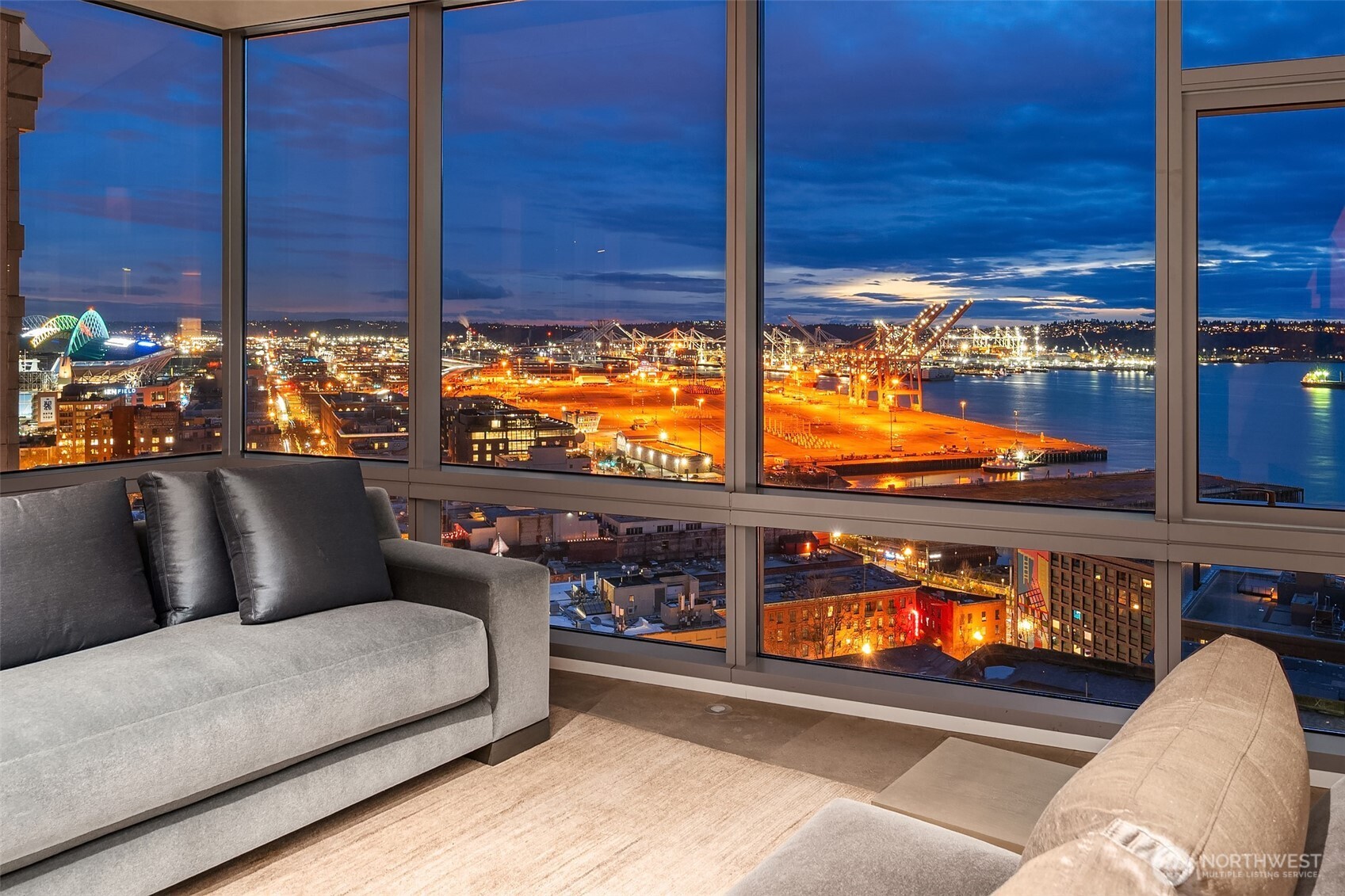 715 2nd Avenue, Unit 1501 Seattle, WA 98104 - Photo 8 of 40 a living room with large windows