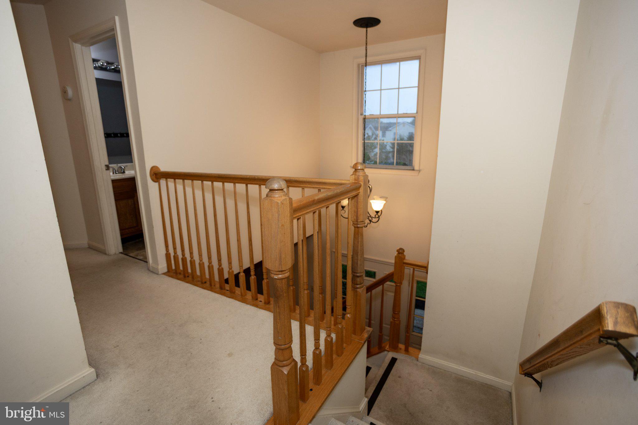 10412 Labrador Loop Manassas, VA 20112 - Photo 35 of 58 Bright and inviting staircase view.
