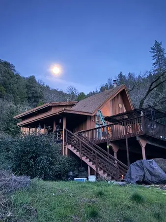 front view of a house with a big yard