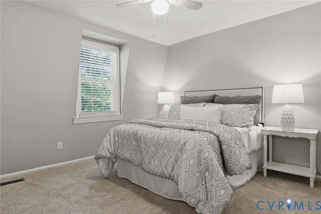 22 Ashinghurst Road, Unit 22 Henrico, VA 23238 - Photo 15 of 25 a bedroom with a bed and a window