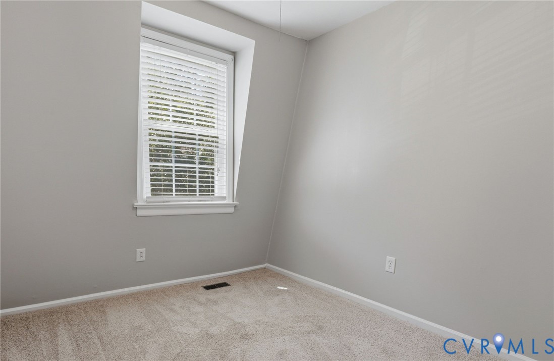 22 Ashinghurst Road, Unit 22 Henrico, VA 23238 - Photo 20 of 25 an empty room with a window