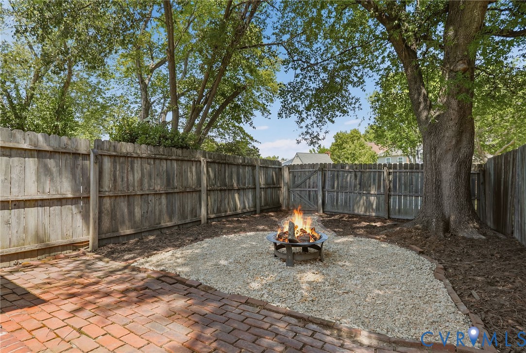 22 Ashinghurst Road, Unit 22 Henrico, VA 23238 - Photo 22 of 25 a view of a backyard with a patio