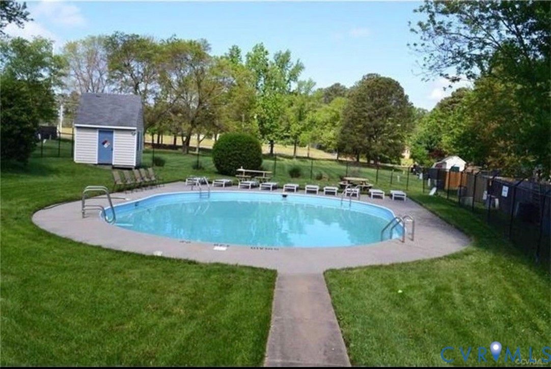 22 Ashinghurst Road, Unit 22 Henrico, VA 23238 - Photo 25 of 25 a view of a house with a swimming pool