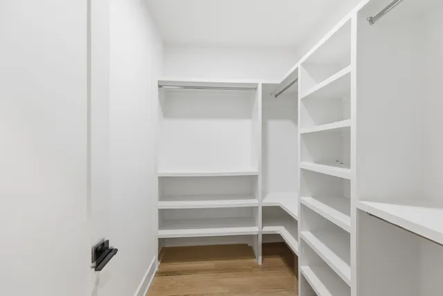 a view of a balcony with wooden floor