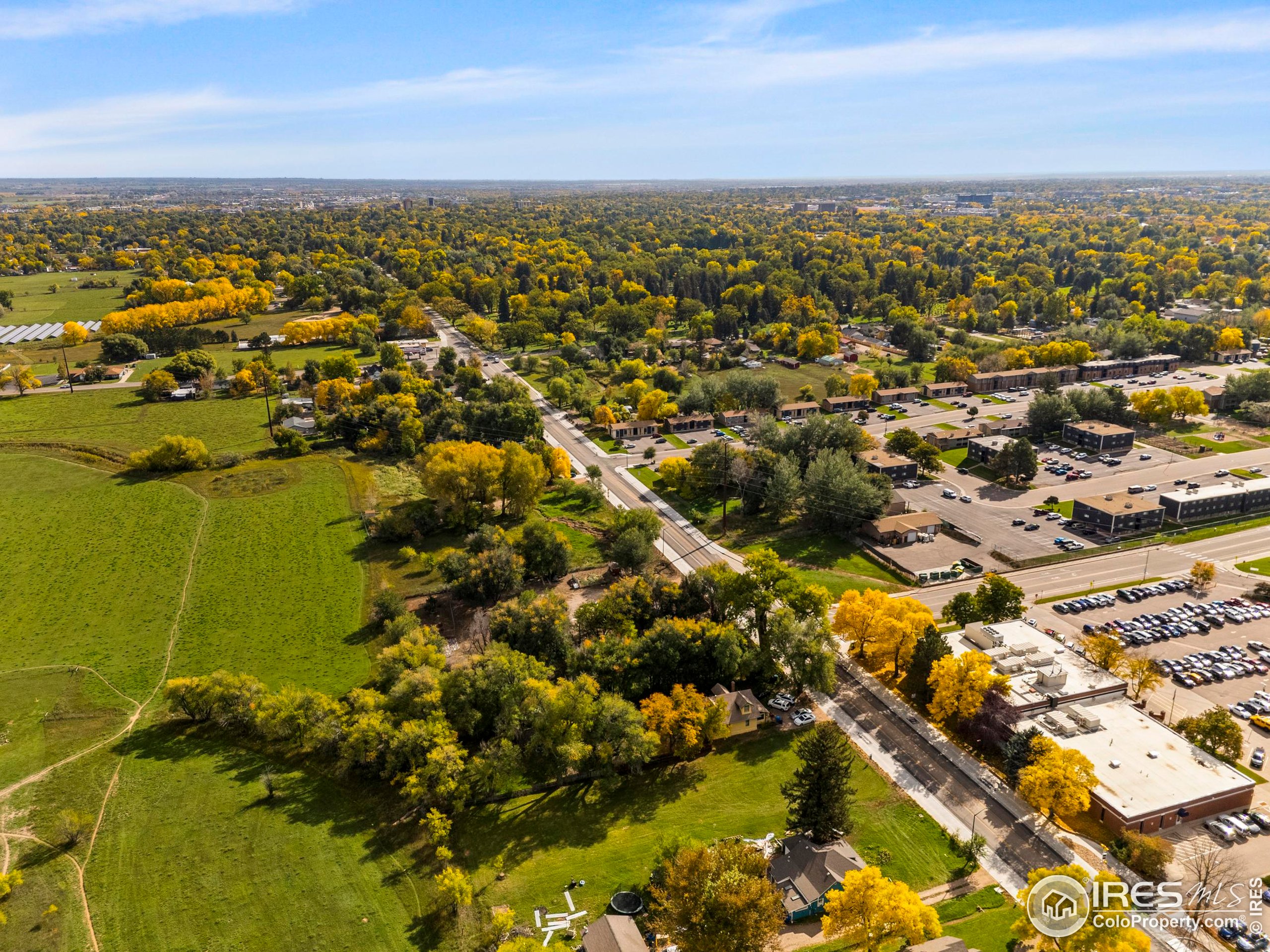 0 Laporte Avenue Fort Collins, CO 80521 - Photo 9 of 22 an aerial view of residential building and lake