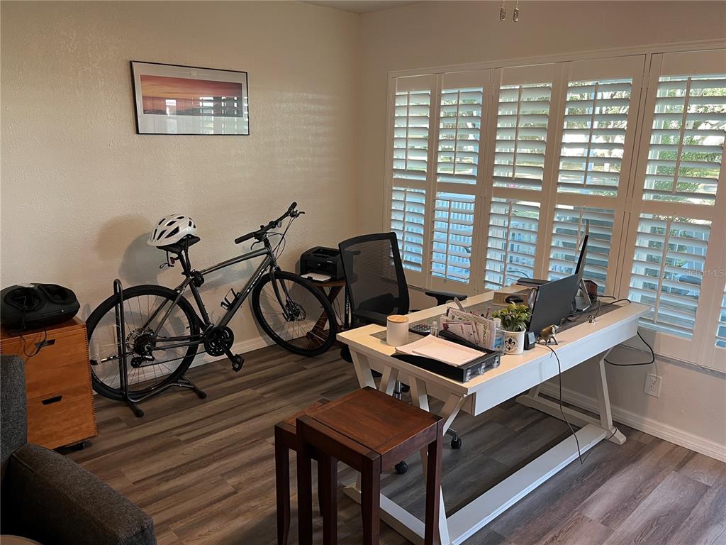 2254 Norwegian Drive, Unit 6 Clearwater, FL 33763 - Photo 14 of 56 a view of a workspace with furniture and a window