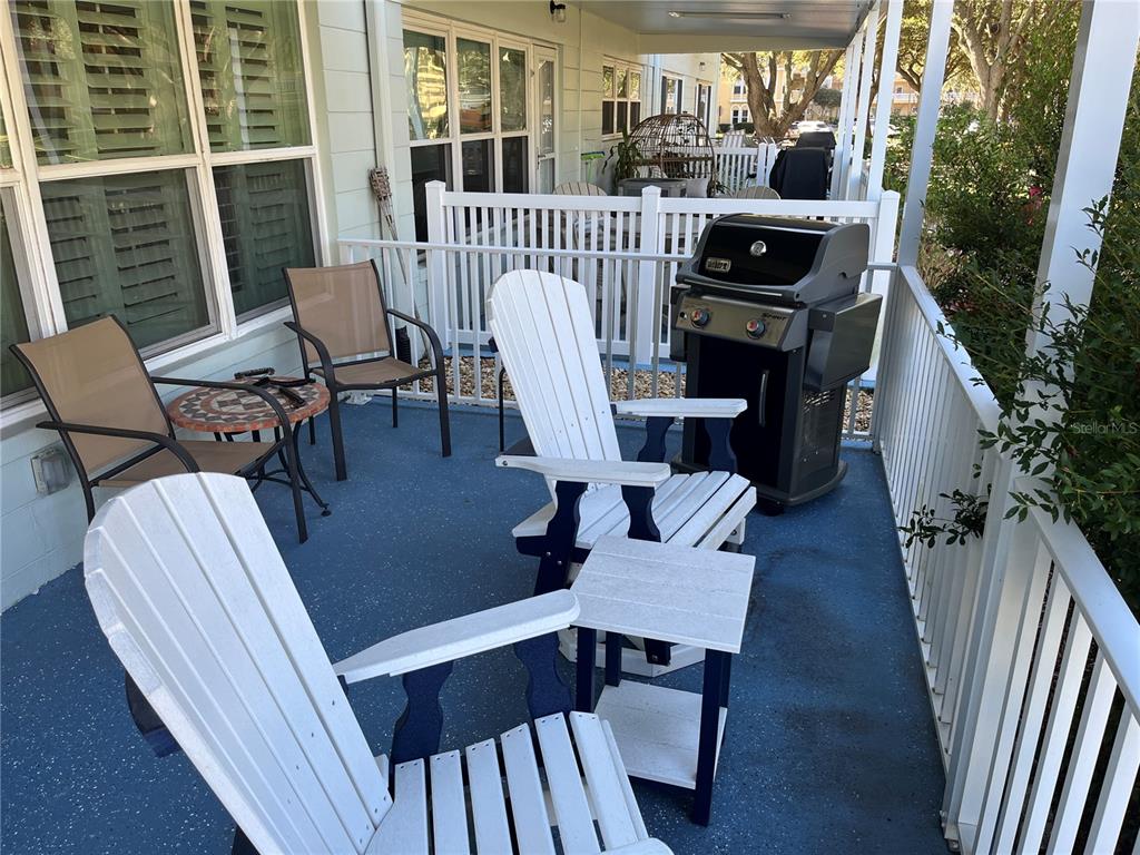 2254 Norwegian Drive, Unit 6 Clearwater, FL 33763 - Photo 31 of 56 a view of a dining room with furniture window and wooden floor