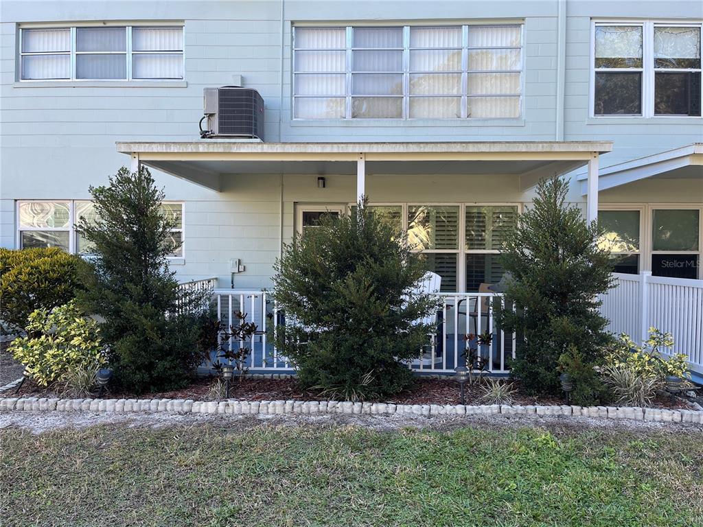 2254 Norwegian Drive, Unit 6 Clearwater, FL 33763 - Photo 33 of 56 a front view of a house with garden