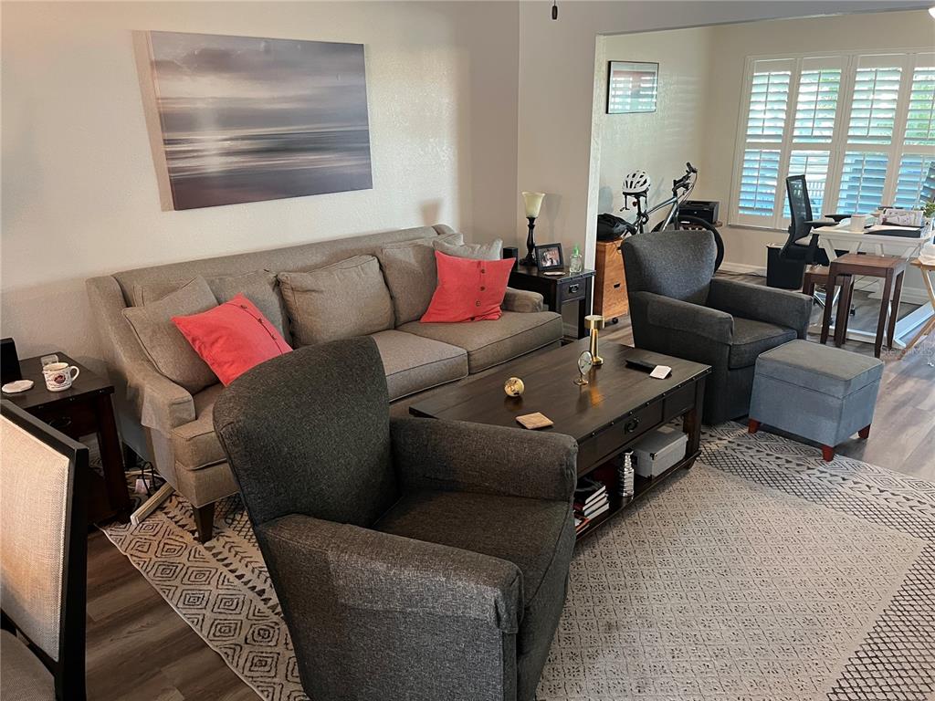 2254 Norwegian Drive, Unit 6 Clearwater, FL 33763 - Photo 6 of 56 a living room with furniture and a window