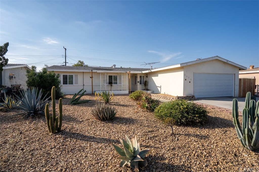 Recently landscaped with Water-tolerant desert scape ...