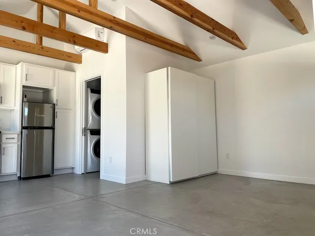 a bathroom with a toilet and a vanity