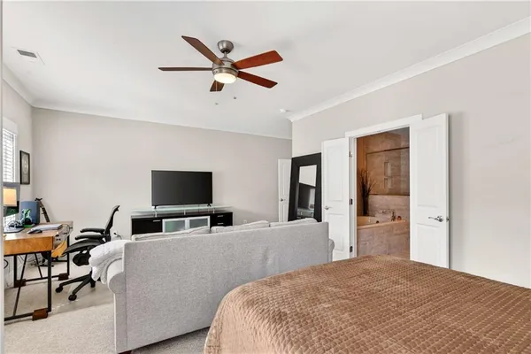 a bedroom with a bed and furniture