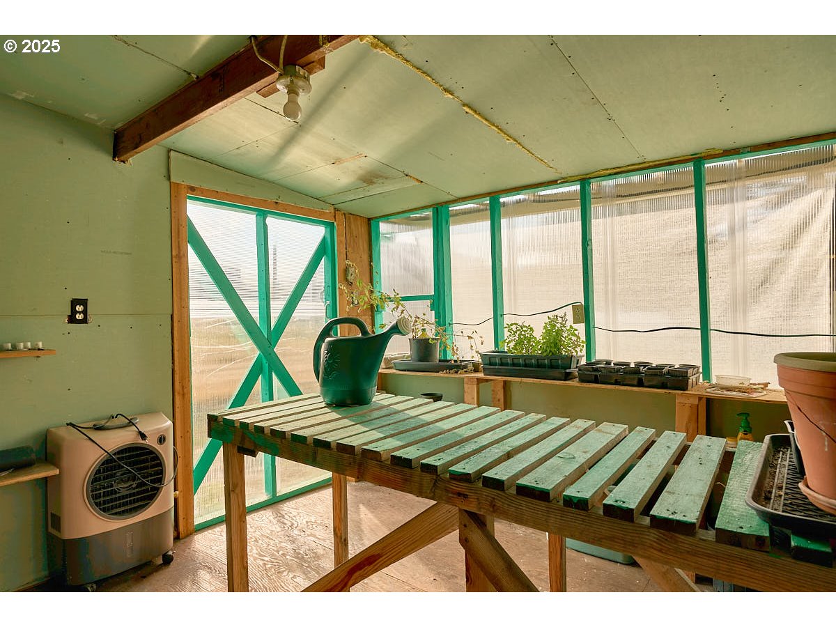 402 South East Street Joseph, OR 97846 - Photo 19 of 22 a living room with a table or chairs and a wooden floor