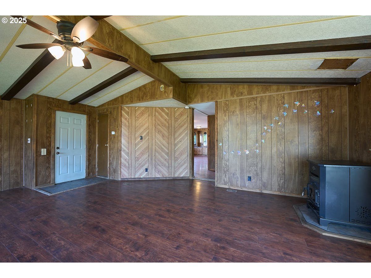 402 South East Street Joseph, OR 97846 - Photo 6 of 22 a view of an empty room with wooden floor and a window