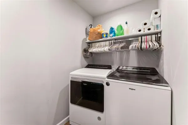 a utility room with dryer and washer