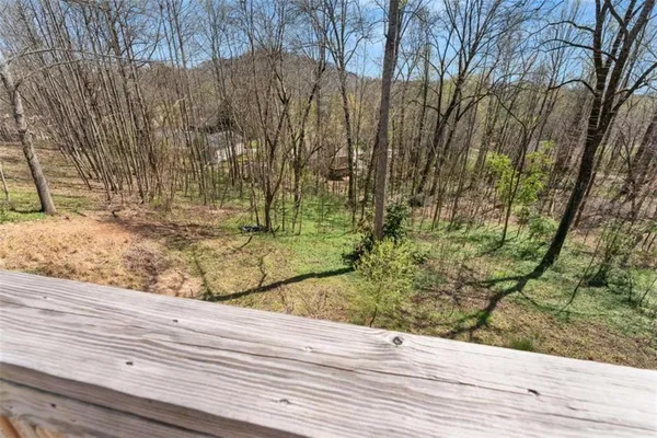 a view of a backyard of the house