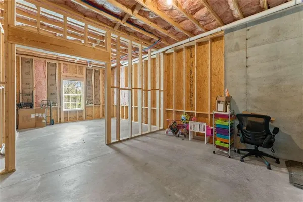 a view of an empty room with stairs
