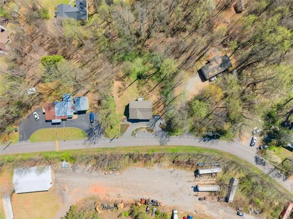 a view of swimming pool with a yard