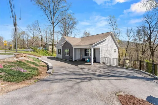 a house with trees in front of it