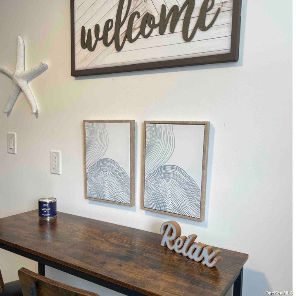 65 Long Beach, undefined 00000 - Photo 6 of 10 a view of room with furniture and wooden floor