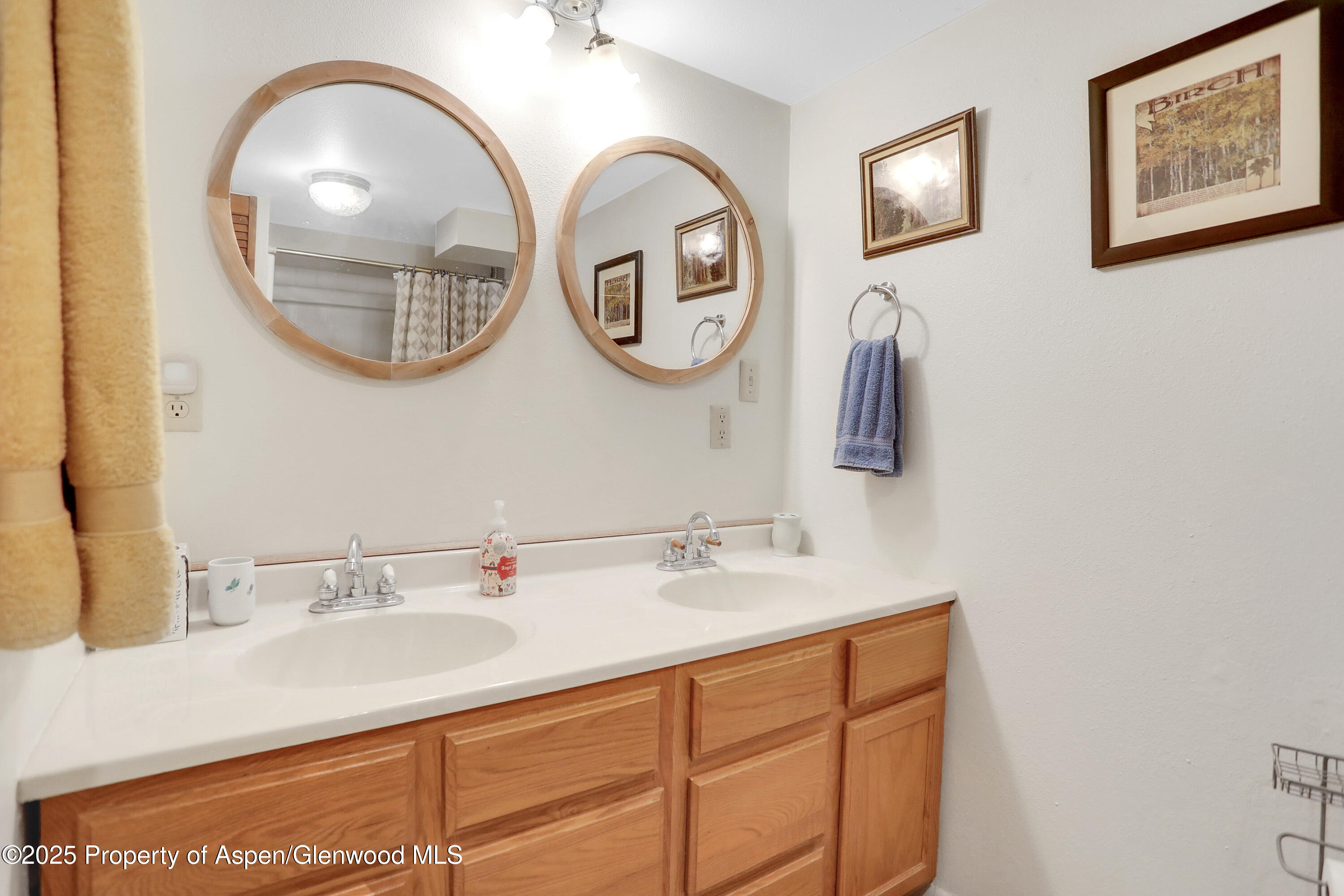 901 Pershing Street Craig, CO 81625 - Photo 29 of 37 a bathroom with a sink and a mirror