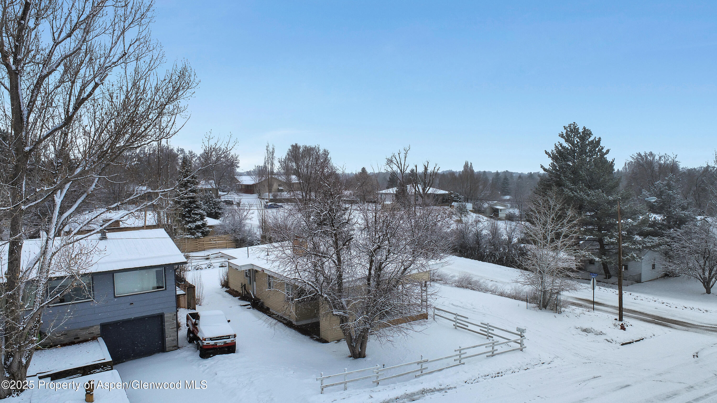 901 Pershing Street Craig, CO 81625 - Photo 33 of 37 a view of a terrace with couches and a fire pit