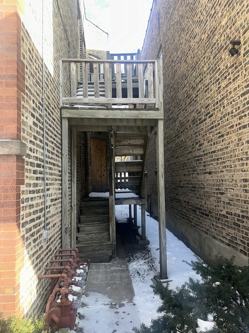7425 South Harvard Avenue Chicago, IL 60621 - Photo 17 of 31 a view of house with outdoor space
