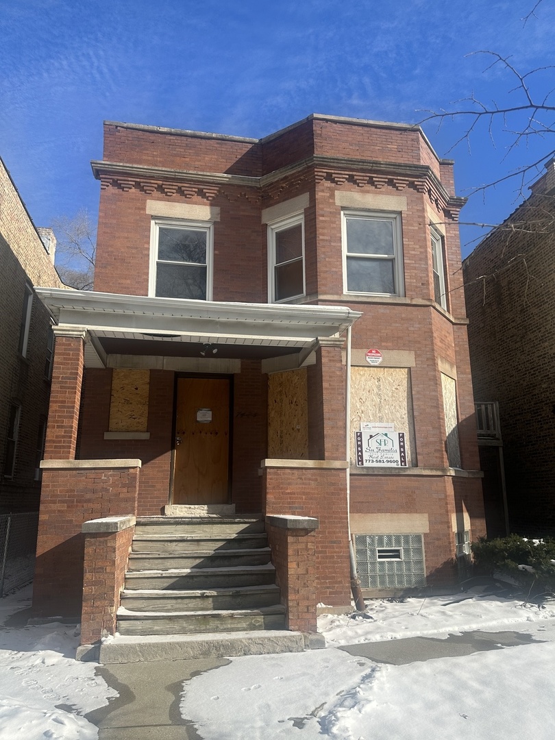 7425 South Harvard Avenue Chicago, IL 60621 - Photo 18 of 31 a front view of a house
