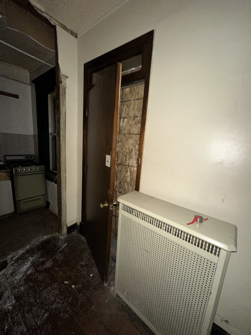 7425 South Harvard Avenue Chicago, IL 60621 - Photo 3 of 31 a view of a hallway to a bedroom