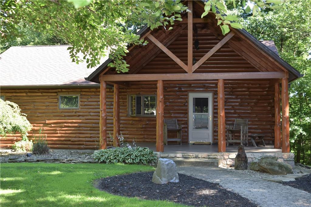 157 South Camp Run Road Fombell, PA 16123 - Photo 1 of 21 Log home is nestled in 22.5 acres of tranquility.