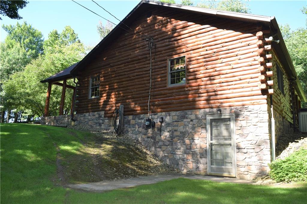 157 South Camp Run Road Fombell, PA 16123 - Photo 15 of 21 Walk out from basement to your beautiful yard.