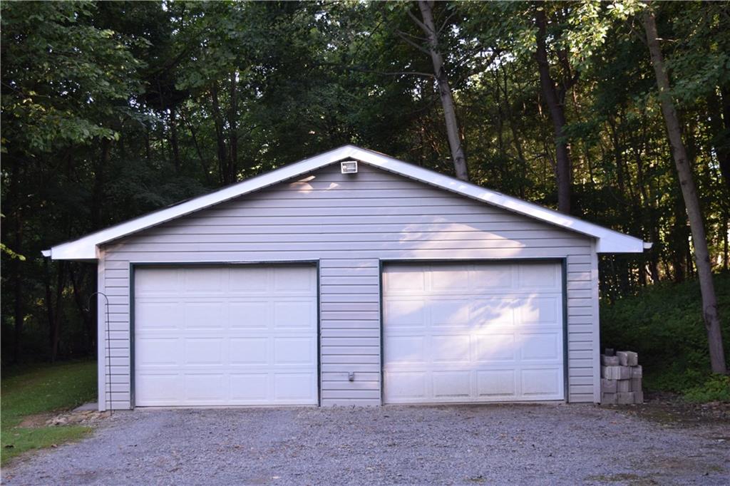 157 South Camp Run Road Fombell, PA 16123 - Photo 20 of 21 Two car detached garage with garage door openers.