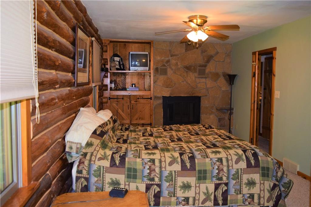 157 South Camp Run Road Fombell, PA 16123 - Photo 6 of 21 Master room with plenty of closet space and decorative fireplace.