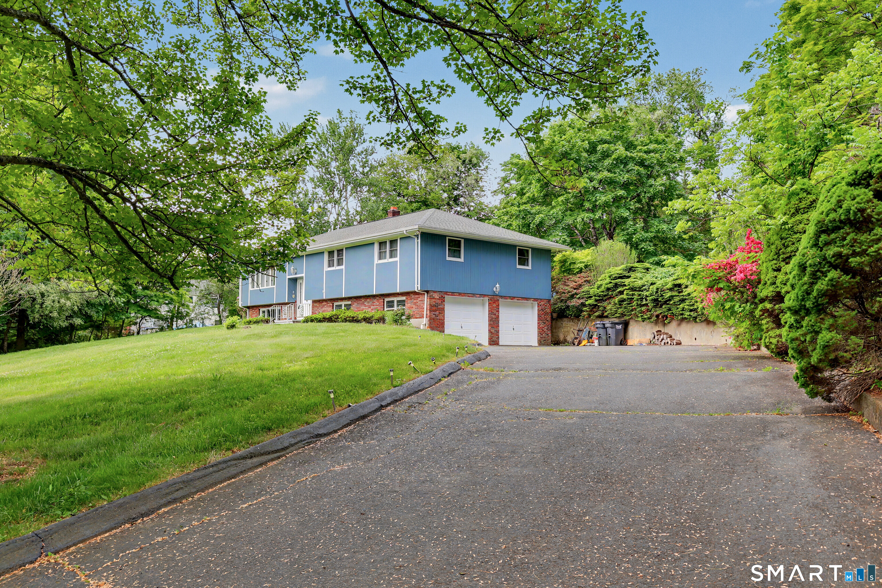 44 Haverhill Road Trumbull, CT 06611 - Photo 2 of 32 a view of a house with a yard
