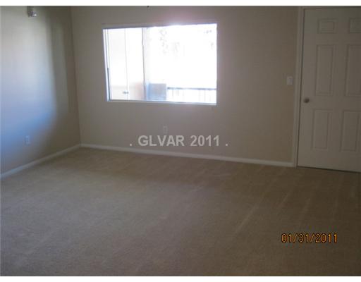 7701 West Robindale Road, Unit 230 Las Vegas, NV 89113 - Photo 2 of 9 Living Room.