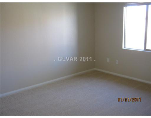7701 West Robindale Road, Unit 230 Las Vegas, NV 89113 - Photo 5 of 9 Master Bedroom.