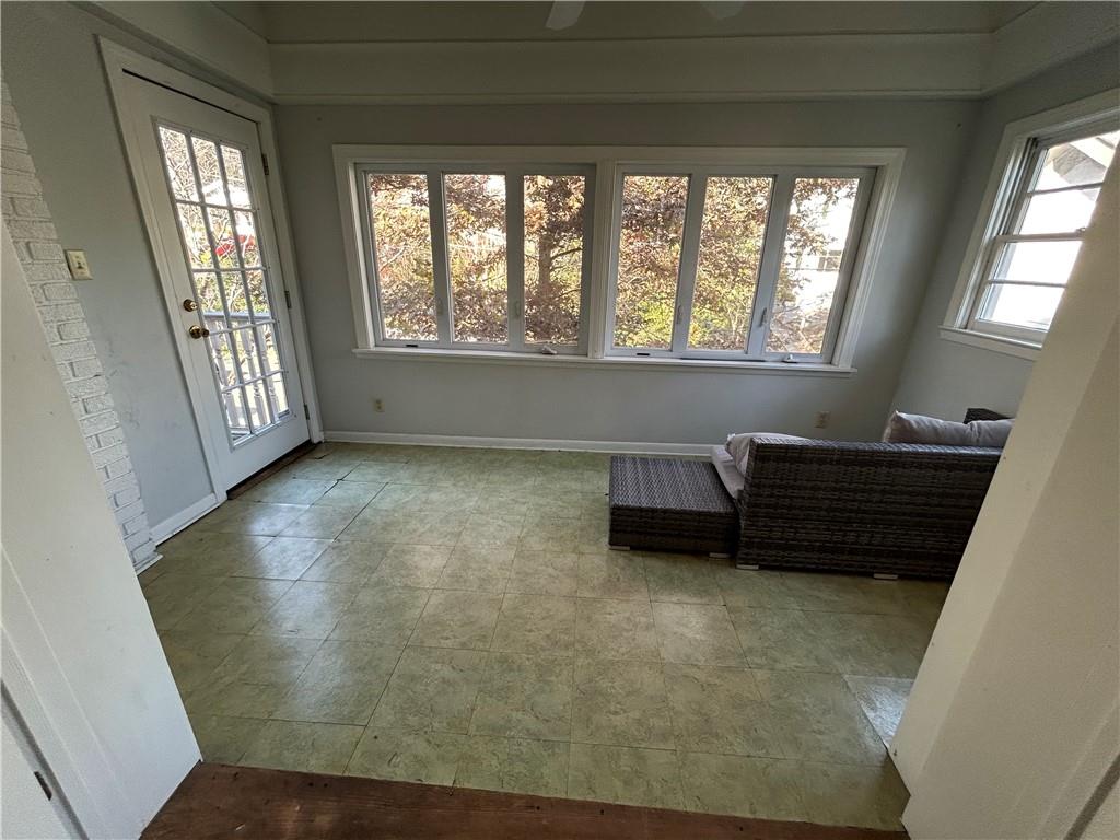 417 8th Street Northeast Atlanta, GA 30309 - Photo 6 of 16 a room with furniture and a window