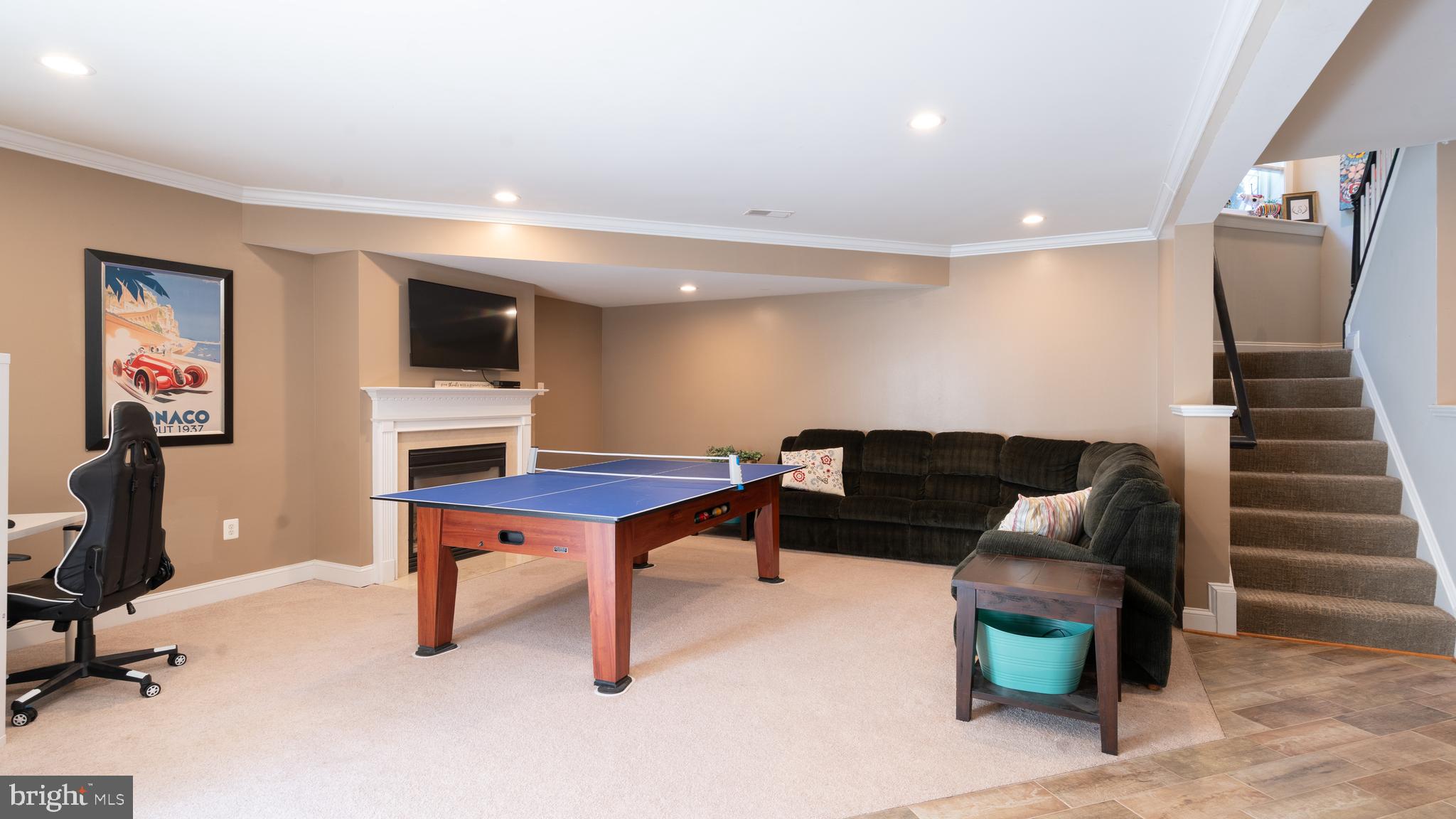 13128 Kahns Road Manassas, VA 20112 - Photo 47 of 61 Lower-Level Rec Room with 3rd Gas Fireplace