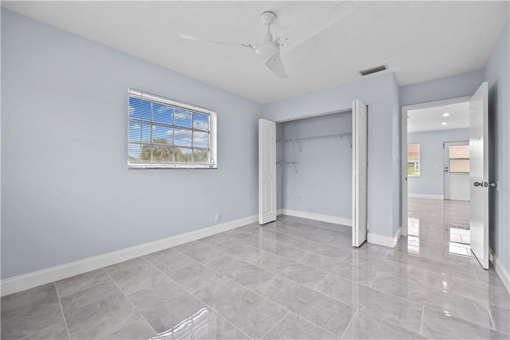 260 Northwest 19th Street, Unit 290 Boca Raton, FL 33432 - Photo 15 of 18 a view of an empty room with a window