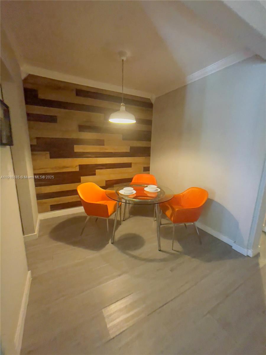 7710 Harding Avenue, Unit 403 Miami Beach, FL 33141 - Photo 4 of 7 a outdoor space with a furniture