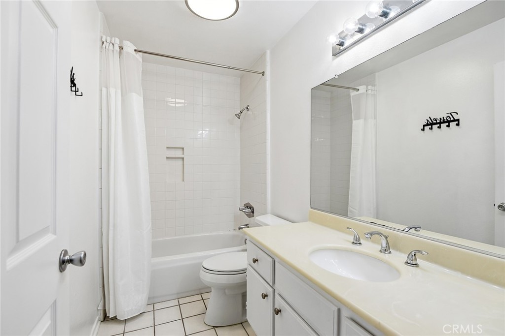 4265 Las Virgenes Road, Unit 2 Calabasas, CA 91302 - Photo 14 of 26 a bathroom with a sink a toilet and shower