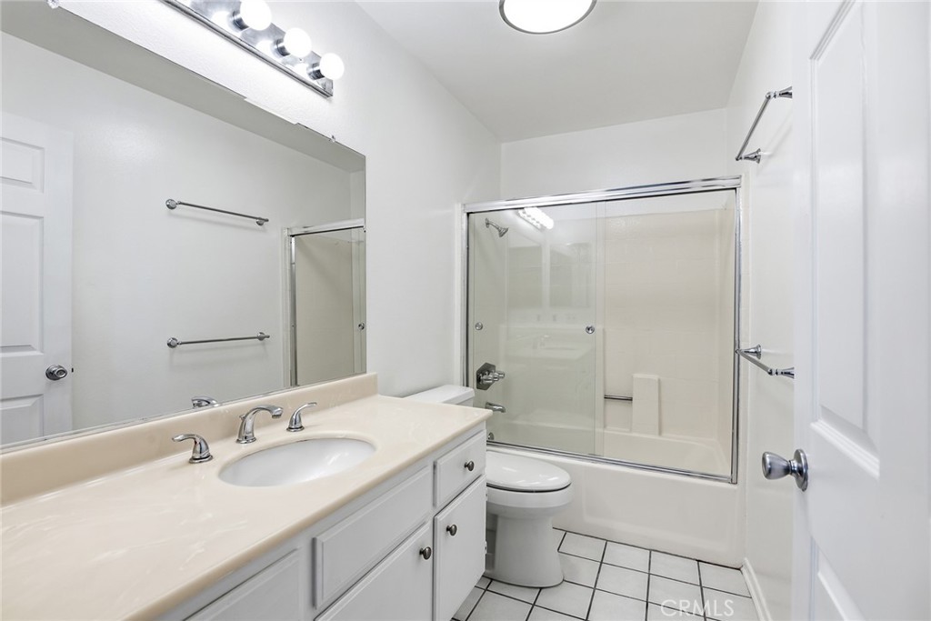 4265 Las Virgenes Road, Unit 2 Calabasas, CA 91302 - Photo 15 of 26 a bathroom with a sink toilet vanity and shower