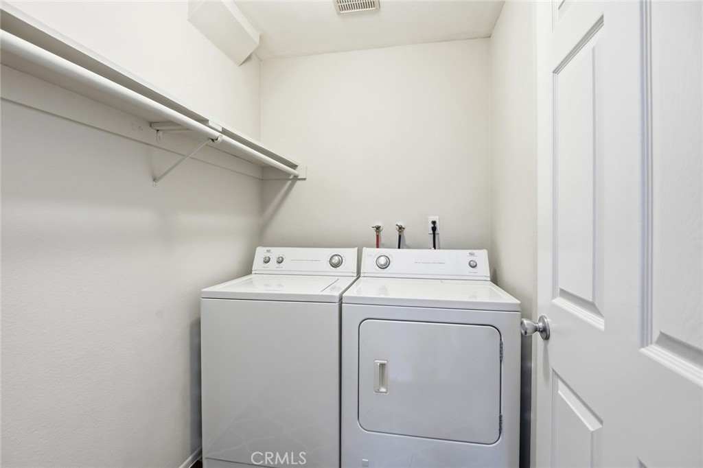 4265 Las Virgenes Road, Unit 2 Calabasas, CA 91302 - Photo 21 of 26 a utility room with dryer and washer