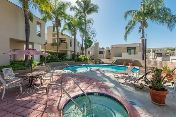 a view of a backyard with a patio