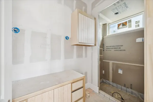 a bathroom with a sink and a shower