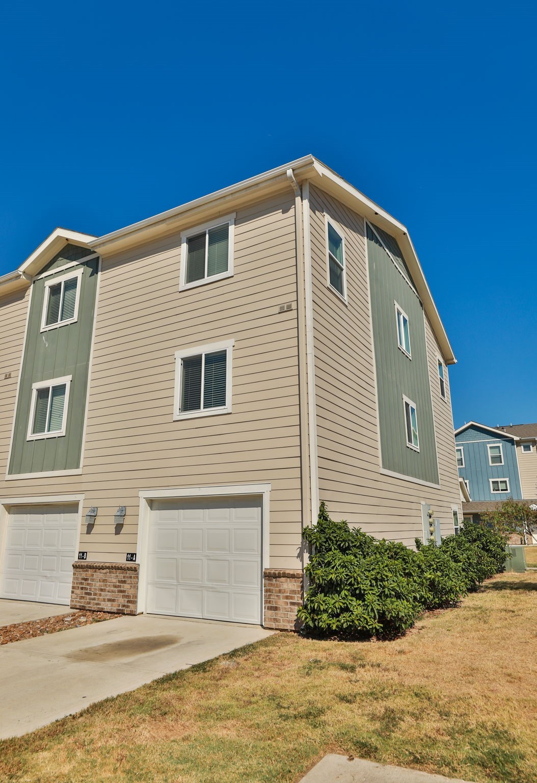 21155 Gosling Road, Unit 11A Spring, TX 77388 - Photo 22 of 27 a front view of a house with a yard