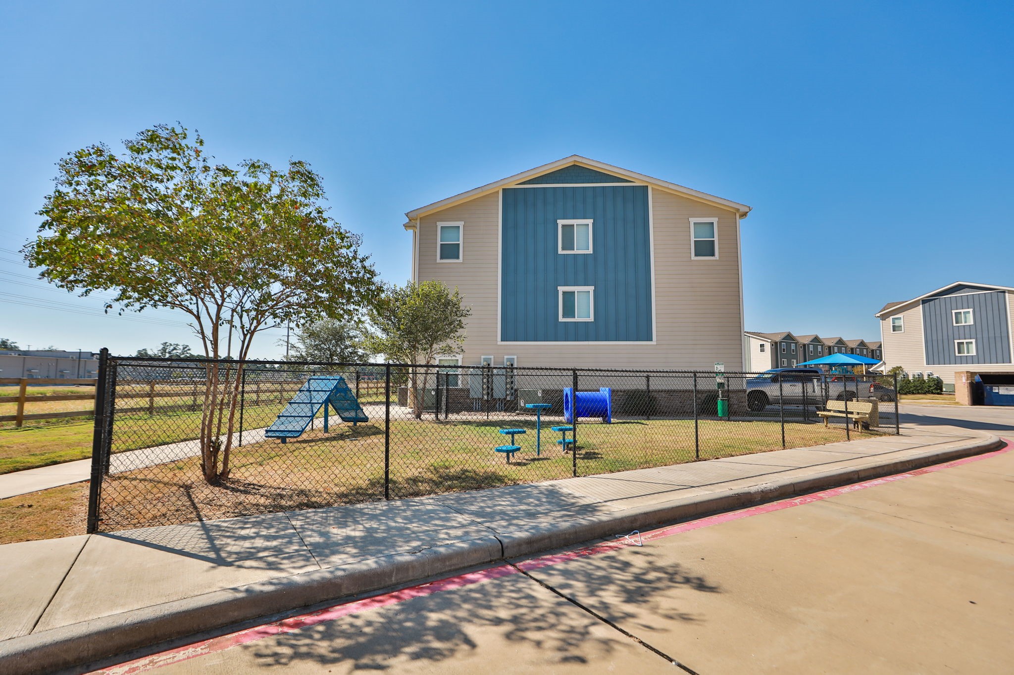 21155 Gosling Road, Unit 11A Spring, TX 77388 - Photo 24 of 27 a view of a house with backyard and sitting area